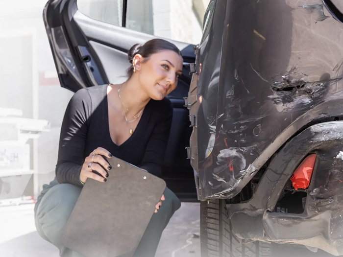 Vehicle body damage being evaluated before a lease return inspection